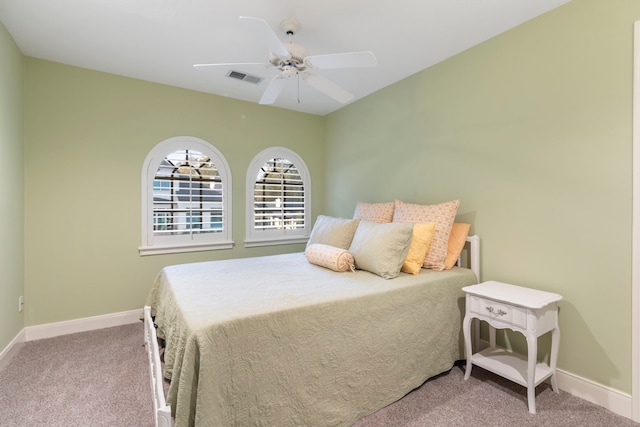 bedroom featuring ceiling fan and carpet flooring