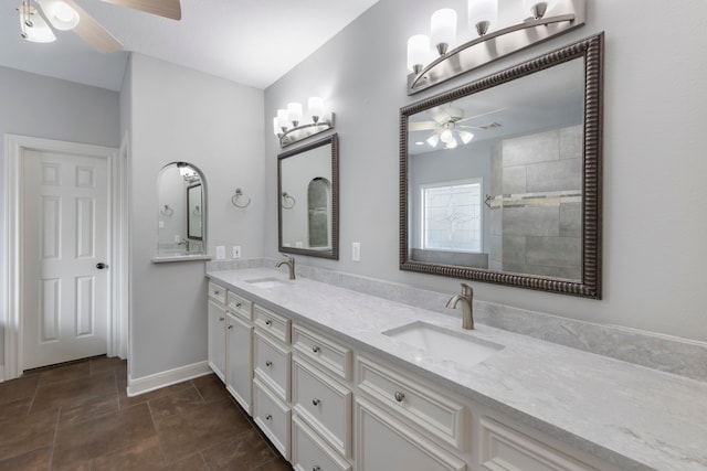 bathroom featuring ceiling fan and vanity