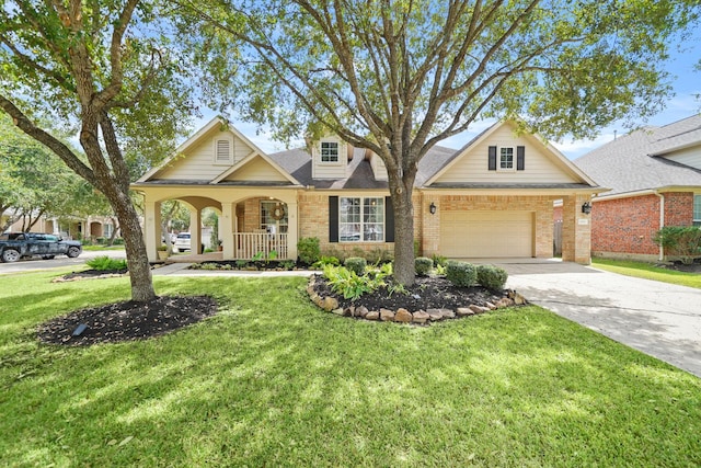 view of front facade featuring a front lawn and covered porch