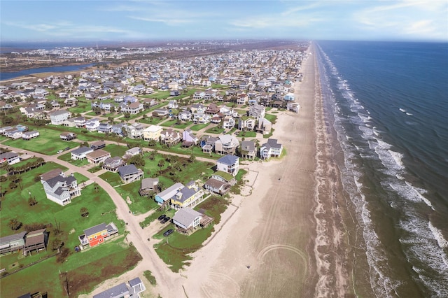 bird's eye view with a view of the beach and a water view