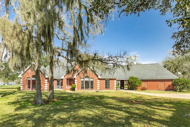 cabin with a front lawn