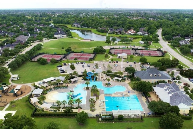 birds eye view of property featuring a water view