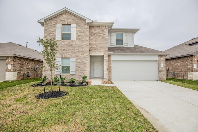 view of front of home with a garage and a front lawn