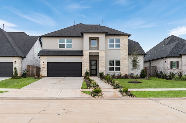 10914 Prospect Hill Ct, Missouri City, TX 77459 - view of front facade with stone siding, stucco siding, driveway, roof with shingles, and an attached garage