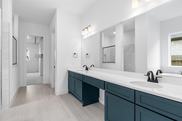 10914 Prospect Hill Ct, Missouri City, TX 77459 - bathroom with double vanity, a tile shower, and a tub to relax in