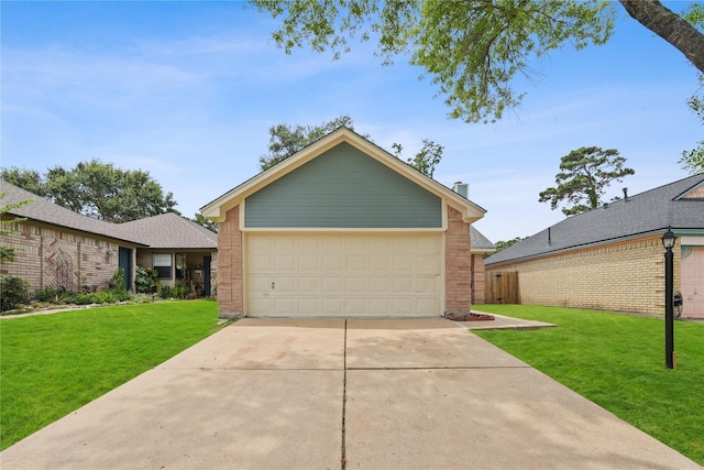 single story home featuring a garage and a front yard