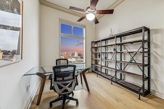3388 Sage Rd Unit 2401, Houston, TX 77056 - home office with healthy amount of natural light, wood finished floors, crown molding, baseboards, and a ceiling fan