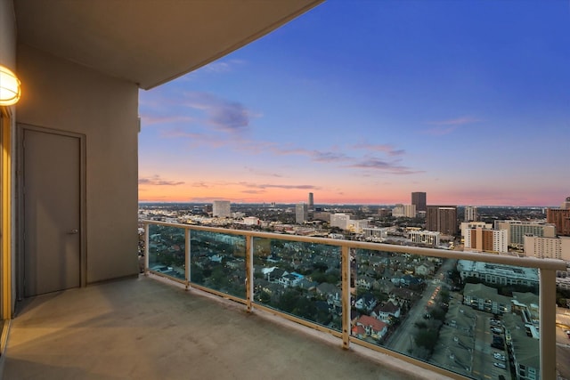 3388 Sage Rd Unit 2401, Houston, TX 77056 - balcony at dusk featuring a city view
