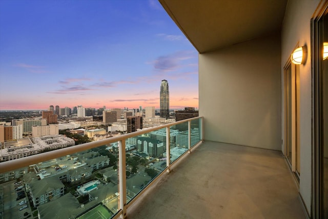 view of balcony at dusk