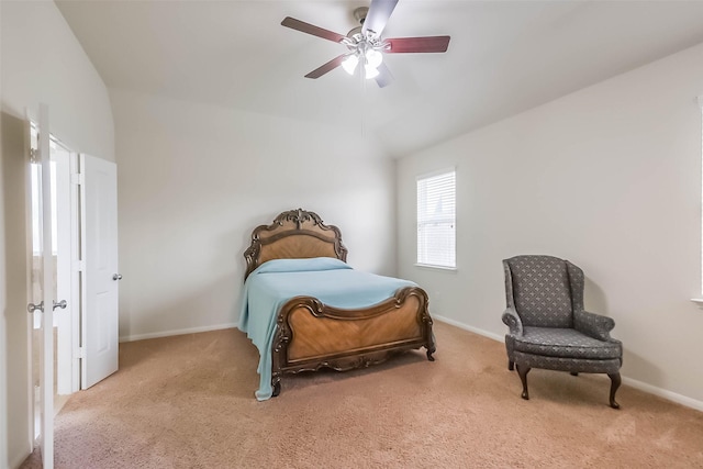 carpeted bedroom featuring ceiling fan and lofted ceiling