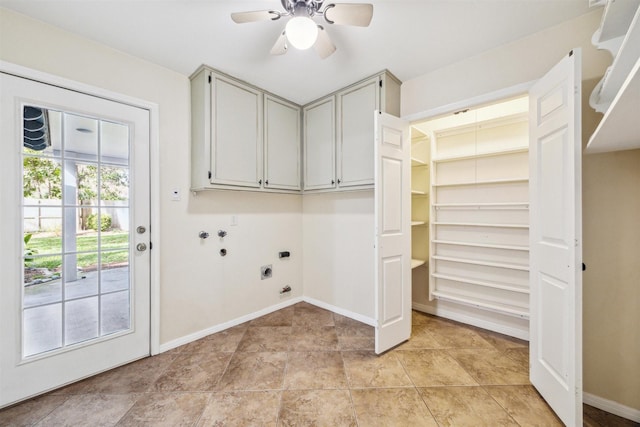 washroom with ceiling fan, hookup for a washing machine, cabinets, and electric dryer hookup