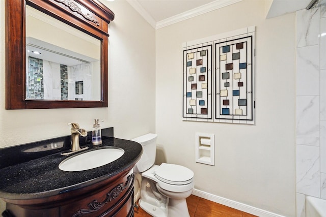 bathroom featuring crown molding, vanity, and toilet