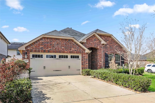 front of property with a garage