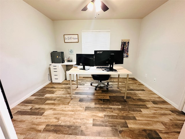 home office with ceiling fan and hardwood / wood-style floors