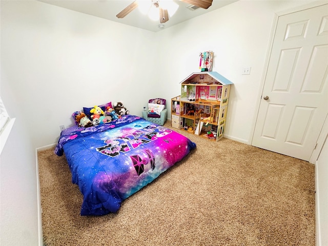 carpeted bedroom featuring ceiling fan