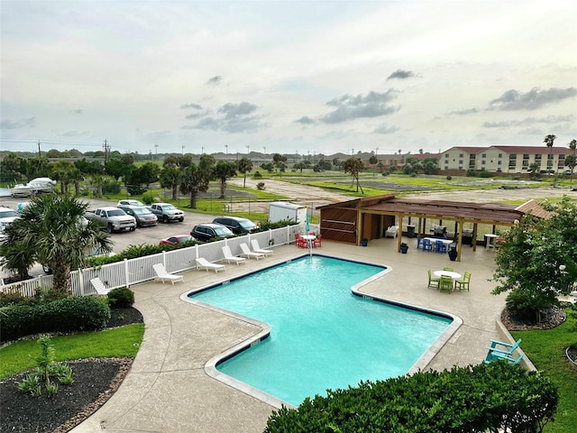 view of pool featuring a patio