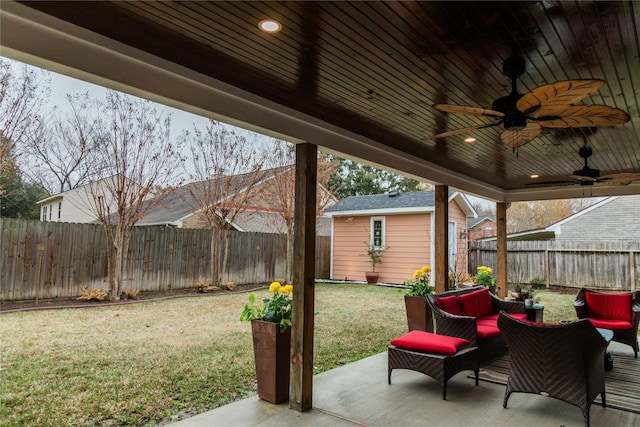 view of patio / terrace with an outdoor structure and ceiling fan