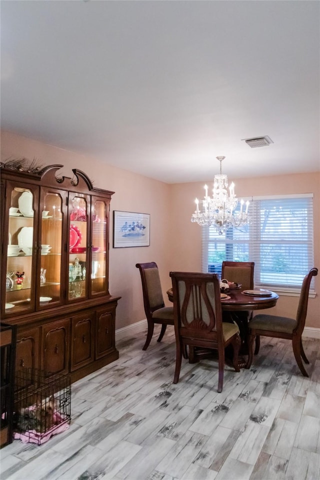 dining room featuring an inviting chandelier