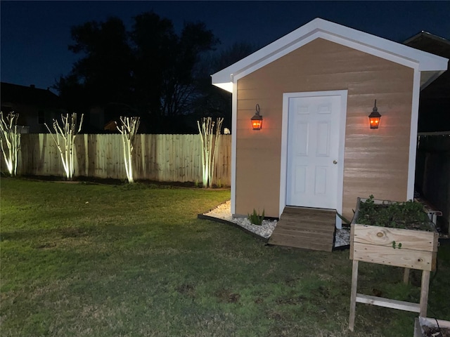 view of outdoor structure with a yard