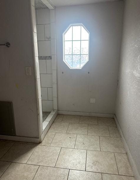 bathroom with tile patterned flooring