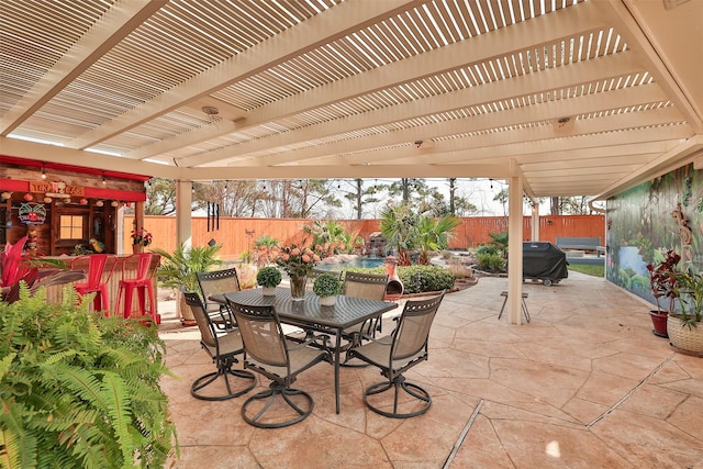 view of patio with outdoor dining space, a fenced backyard, grilling area, and a pergola