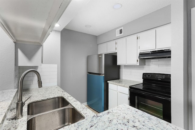 kitchen with sink, stainless steel fridge, backsplash, electric range, and white cabinets