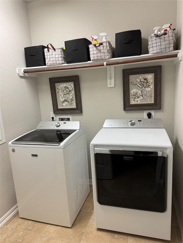 laundry room with separate washer and dryer