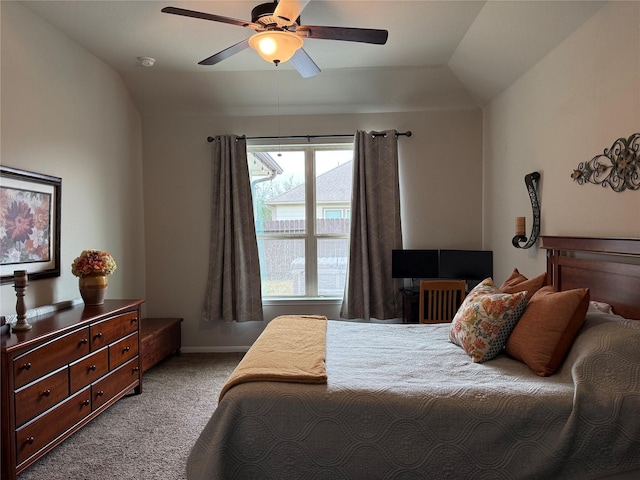 carpeted bedroom featuring ceiling fan and lofted ceiling