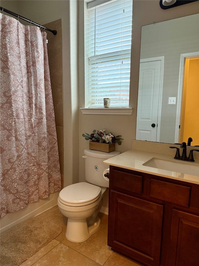 full bathroom with shower / tub combo with curtain, vanity, toilet, and tile patterned floors