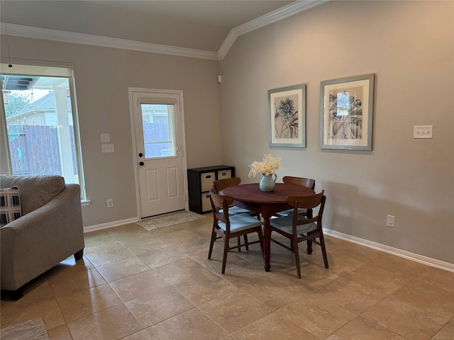 dining area featuring ornamental molding