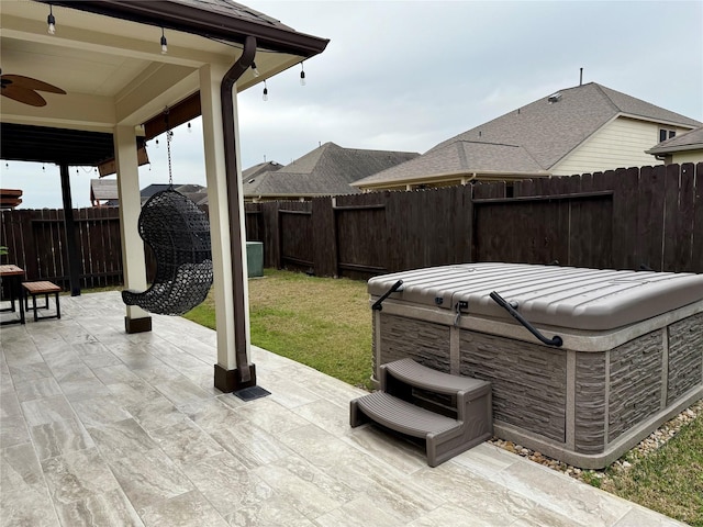 view of patio / terrace featuring ceiling fan