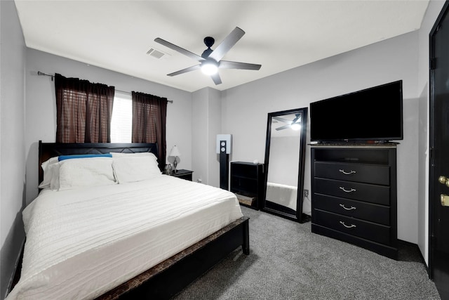 bedroom featuring light colored carpet and ceiling fan