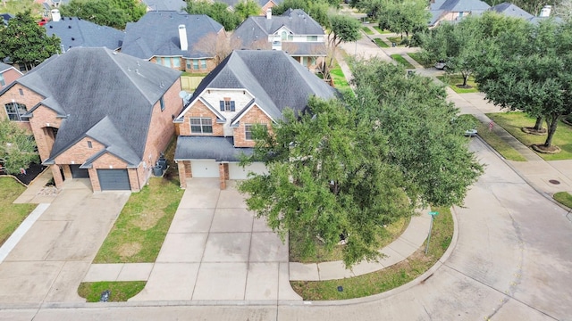 drone / aerial view with a residential view