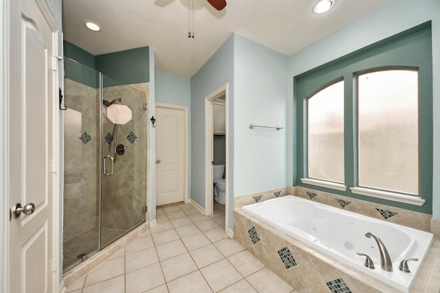 full bathroom with a stall shower, tile patterned flooring, a jetted tub, and toilet