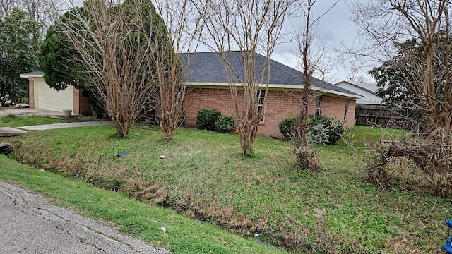 view of property exterior featuring a lawn