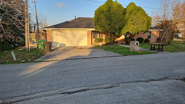 view of front of property with a garage