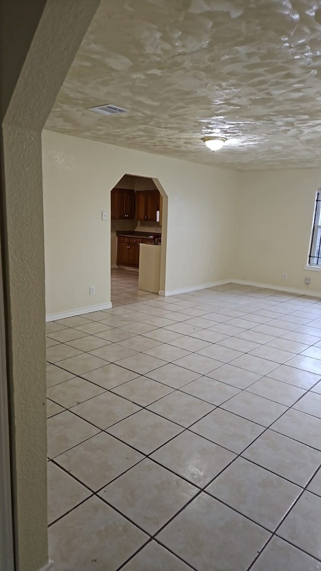 interior space with light tile patterned floors