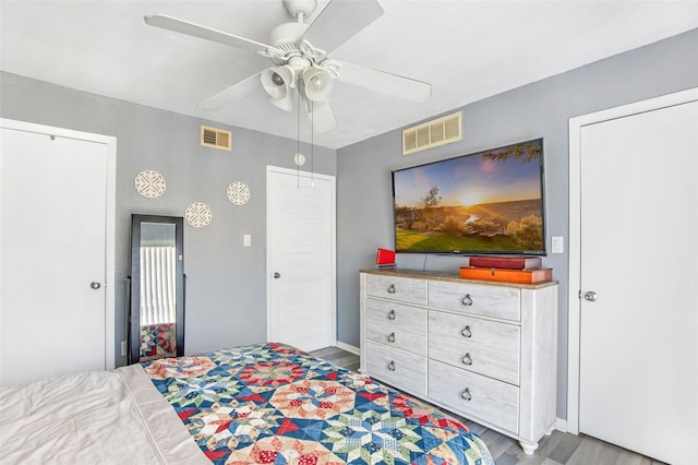 1505 Ward Rd Unit 232, Baytown, TX 77520 - bedroom featuring wood finished floors, ceiling fan, and baseboards