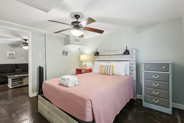 bedroom featuring a ceiling fan, visible vents, finished concrete flooring, and baseboards