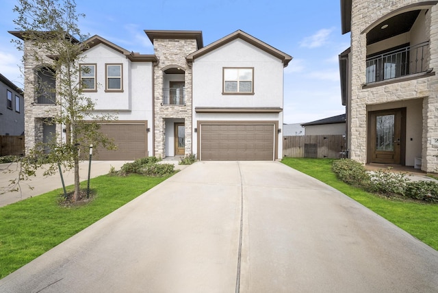 view of front of house with a garage and a front yard