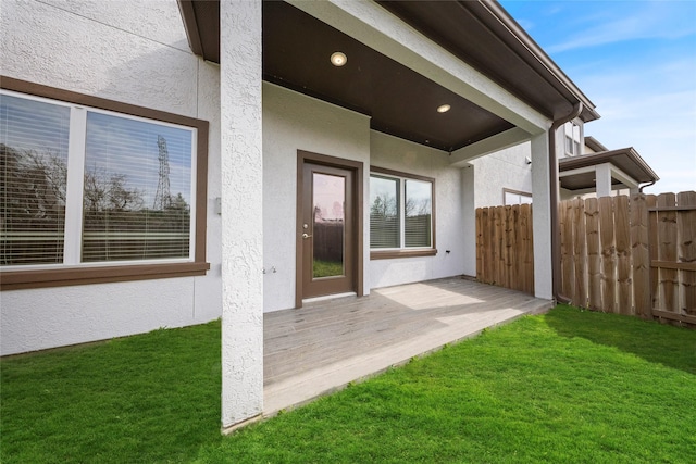 exterior space featuring a patio and a lawn