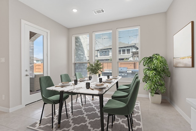 dining area featuring recessed lighting, visible vents, baseboards, and light tile patterned floors