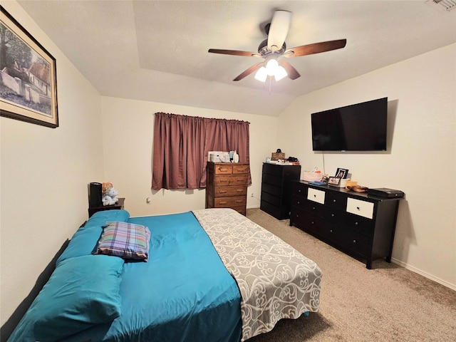 carpeted bedroom with lofted ceiling and ceiling fan