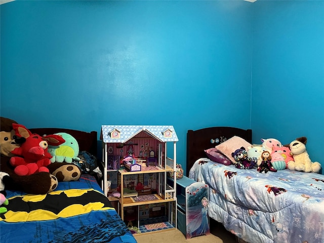 bedroom featuring carpet