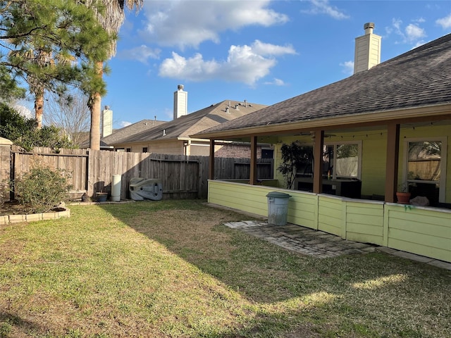 view of yard featuring fence