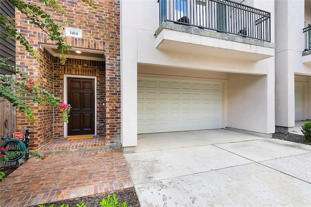 entrance to property featuring a garage