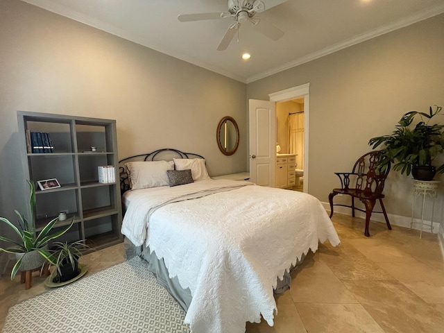 tiled bedroom with ornamental molding, ceiling fan, and ensuite bath