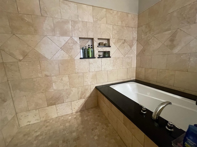 bathroom featuring a tub to relax in