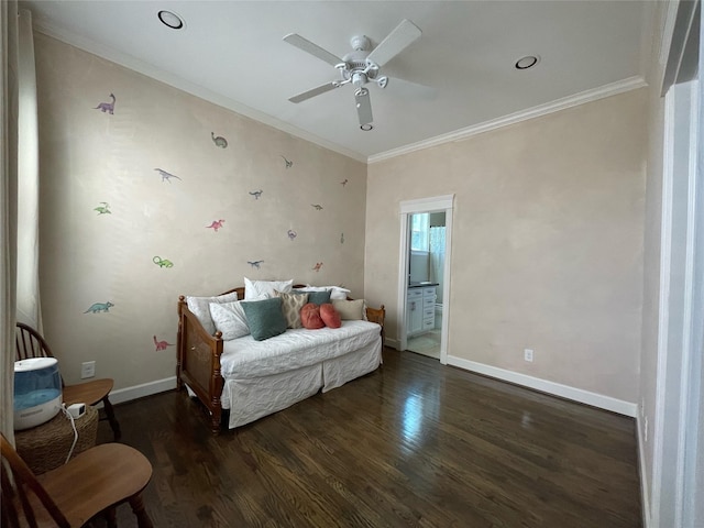 bedroom with dark hardwood / wood-style flooring, crown molding, ceiling fan, and ensuite bathroom