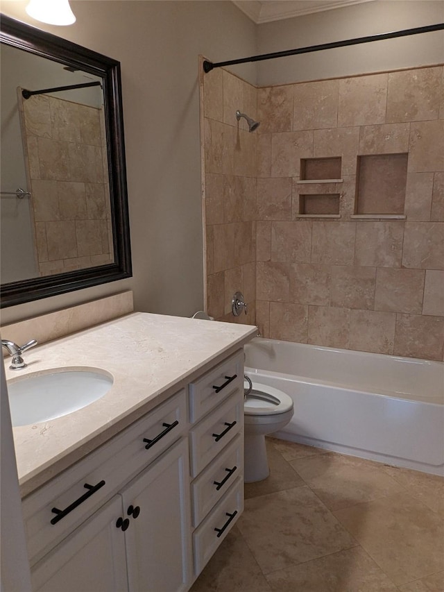 full bathroom featuring vanity, tile patterned flooring, toilet, and tiled shower / bath